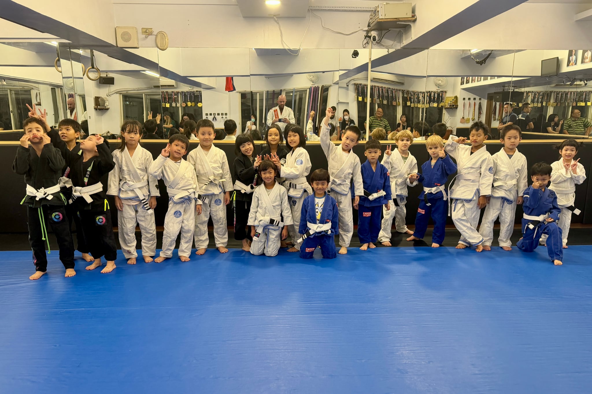 Youth class line-up — students and coaches together after Brazilian Jiu-Jitsu at Catch Jiu Jitsu
